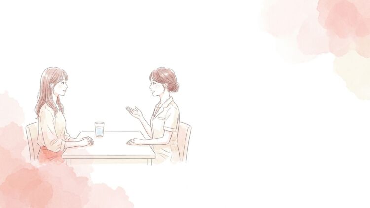 カウンセリングルームで女性がスタッフと向き合って話している様子のイラスト